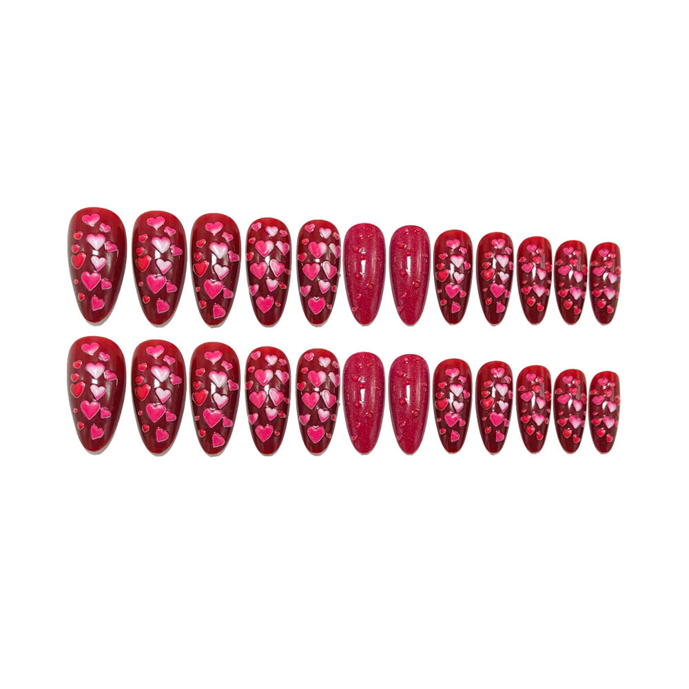 Artificial nails with heart motif and glitter effects Stornfield