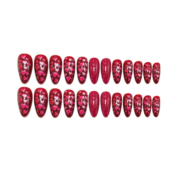 Artificial nails with heart motif and glitter effects Stornfield