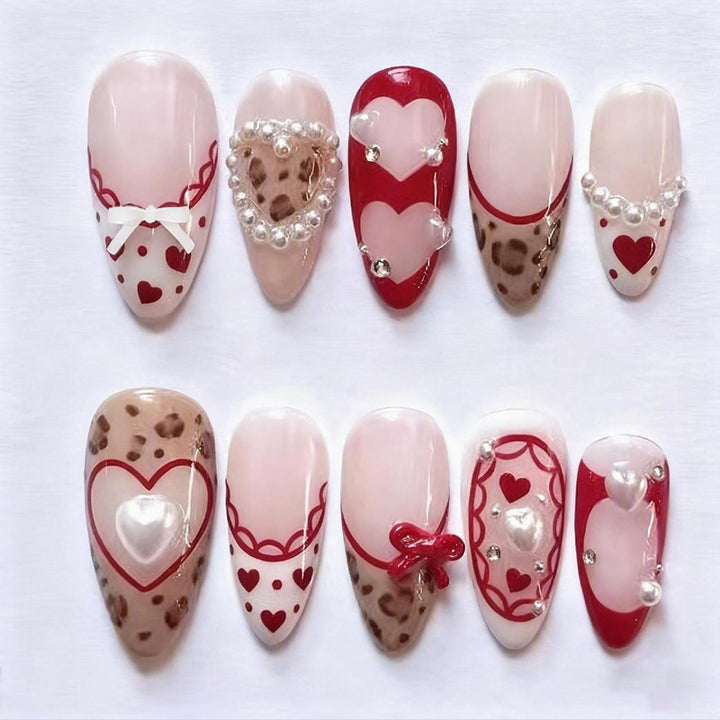 Nail set with romantic heart and bow decorations Stornfield
