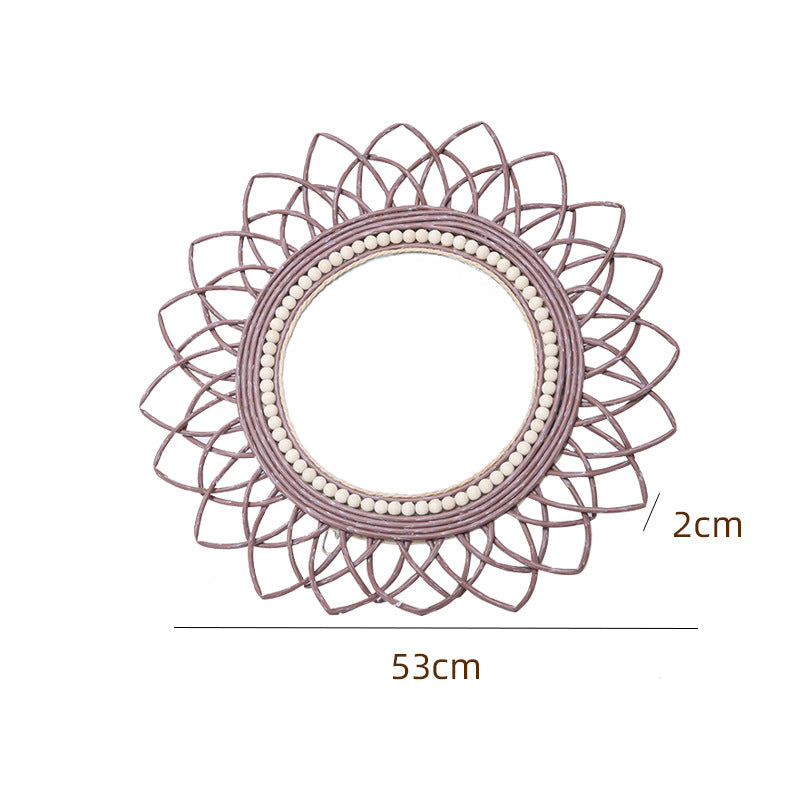 Decorative wall mirror with rattan frame Stornfield