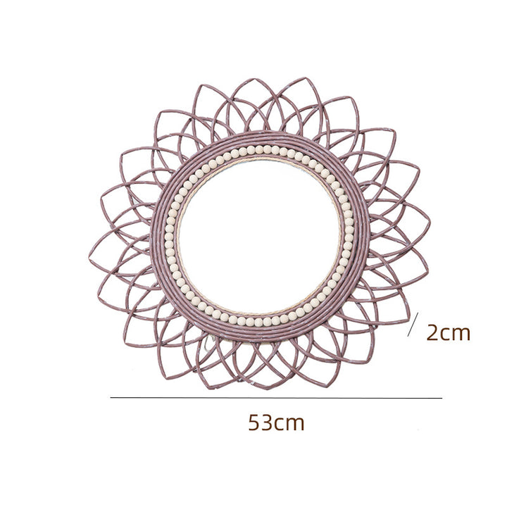 Decorative wall mirror with rattan frame Stornfield