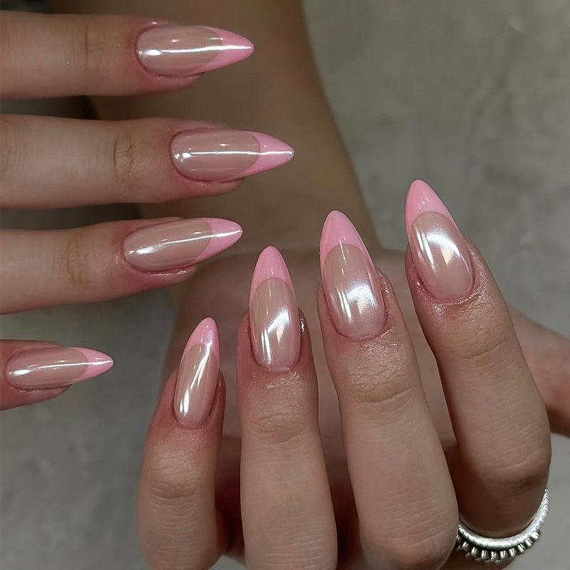 Acrylic nail set with elegant pointed shapes and glossy accents Stornfield