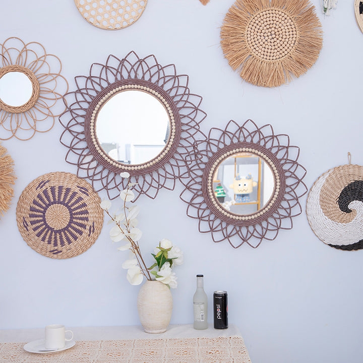 Decorative wall mirror with rattan frame Stornfield