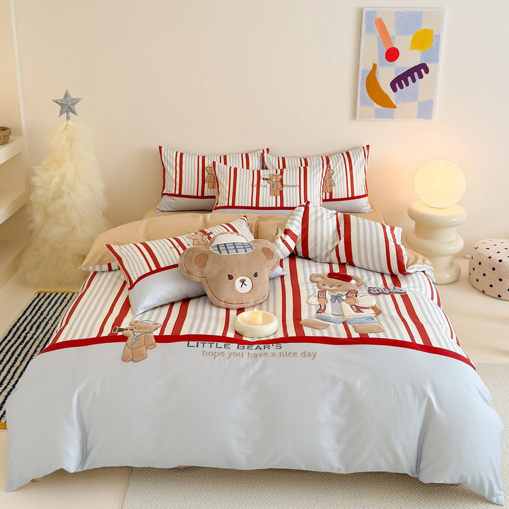 Children's bedding set with embroidered teddy bear design and fine stripes