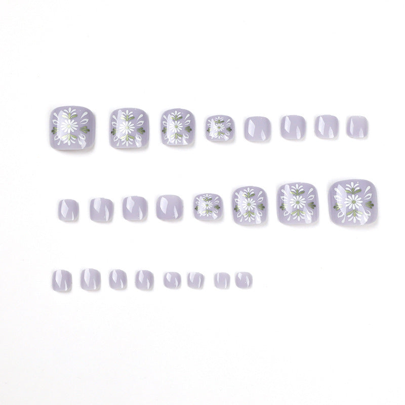 Artistic toenail design with elegant floral design Stornfield