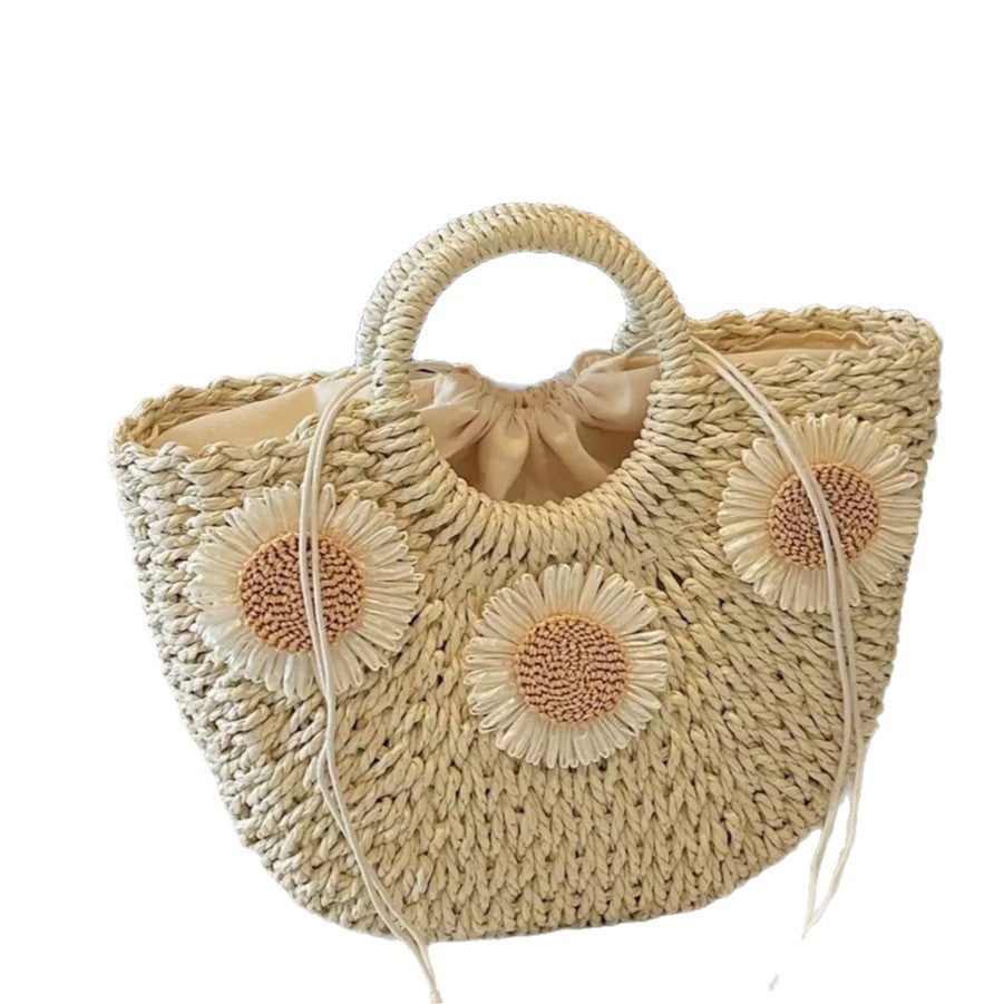 Handbag made of natural material with floral accents Stornfield