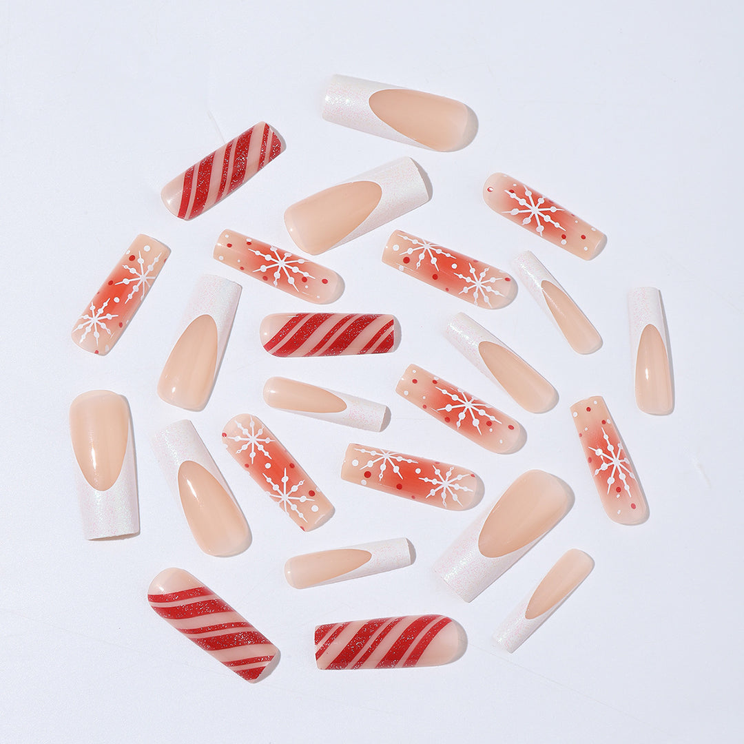 Acrylic nail set with festive candy cane and glitter accents Stornfield
