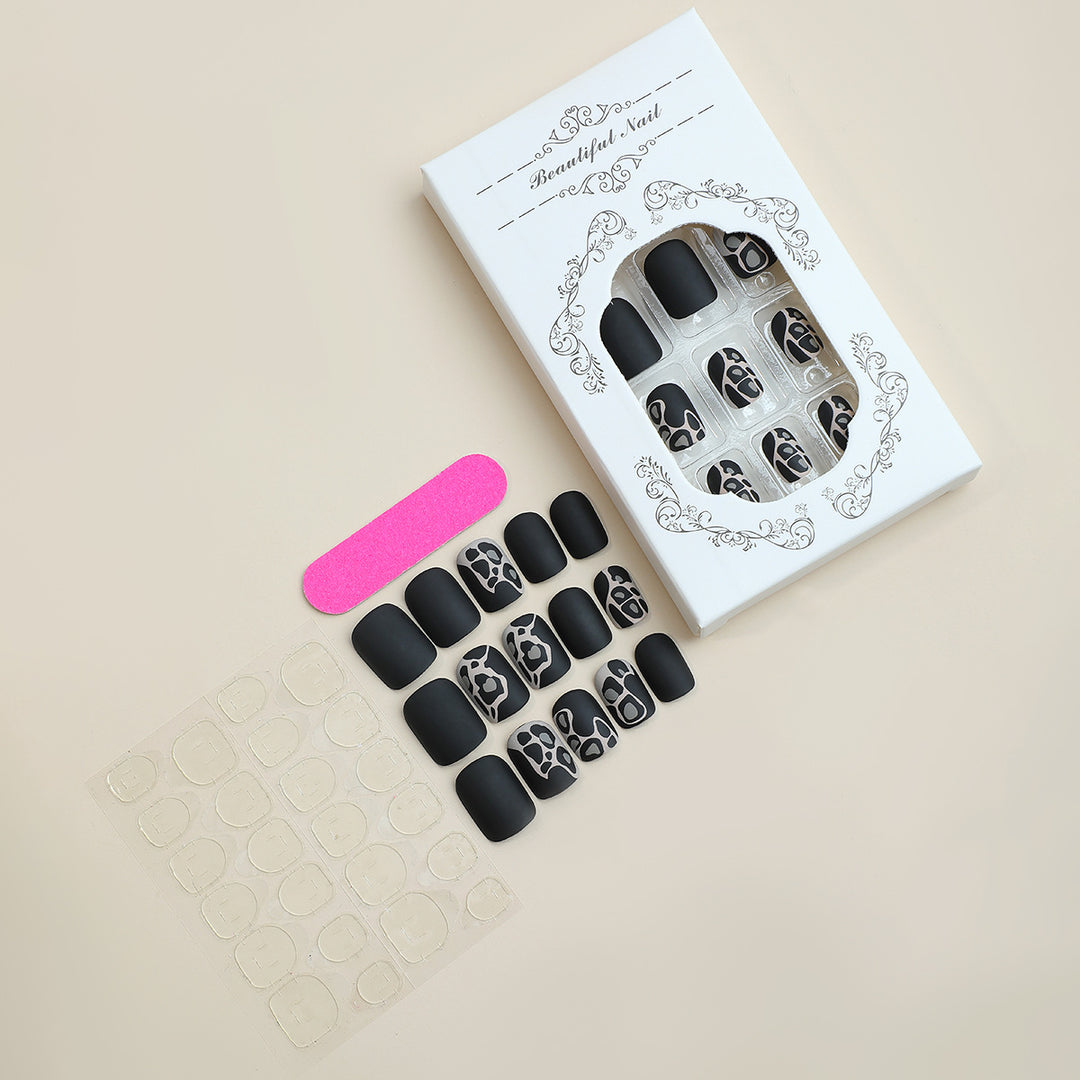 Artistic Press-On Nail Set with Elegant Design Elements Stornfield
