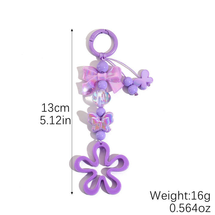 Playful keychain with flower and butterfly details Stornfield