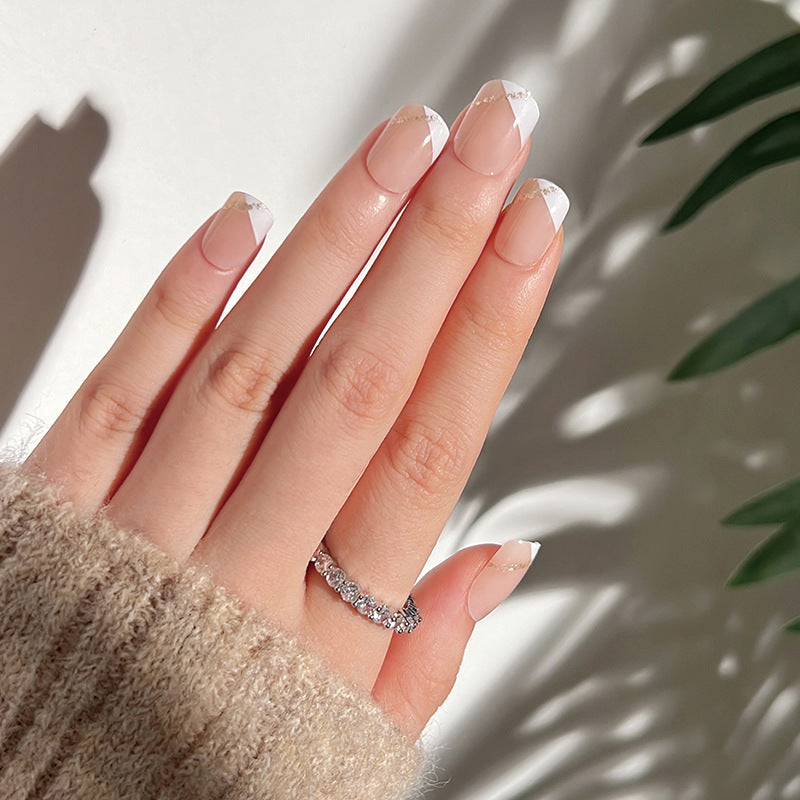 Artful nail extensions with an elegant leaf pattern Stornfield