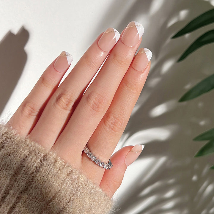 Artful nail extensions with an elegant leaf pattern Stornfield