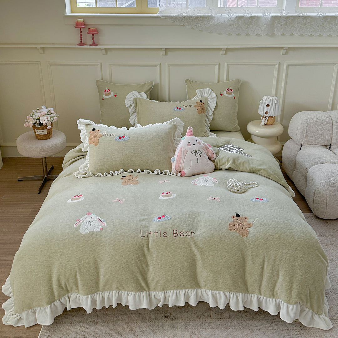 Bedding set with plush surface, ruffled hem and cute embroidery designs