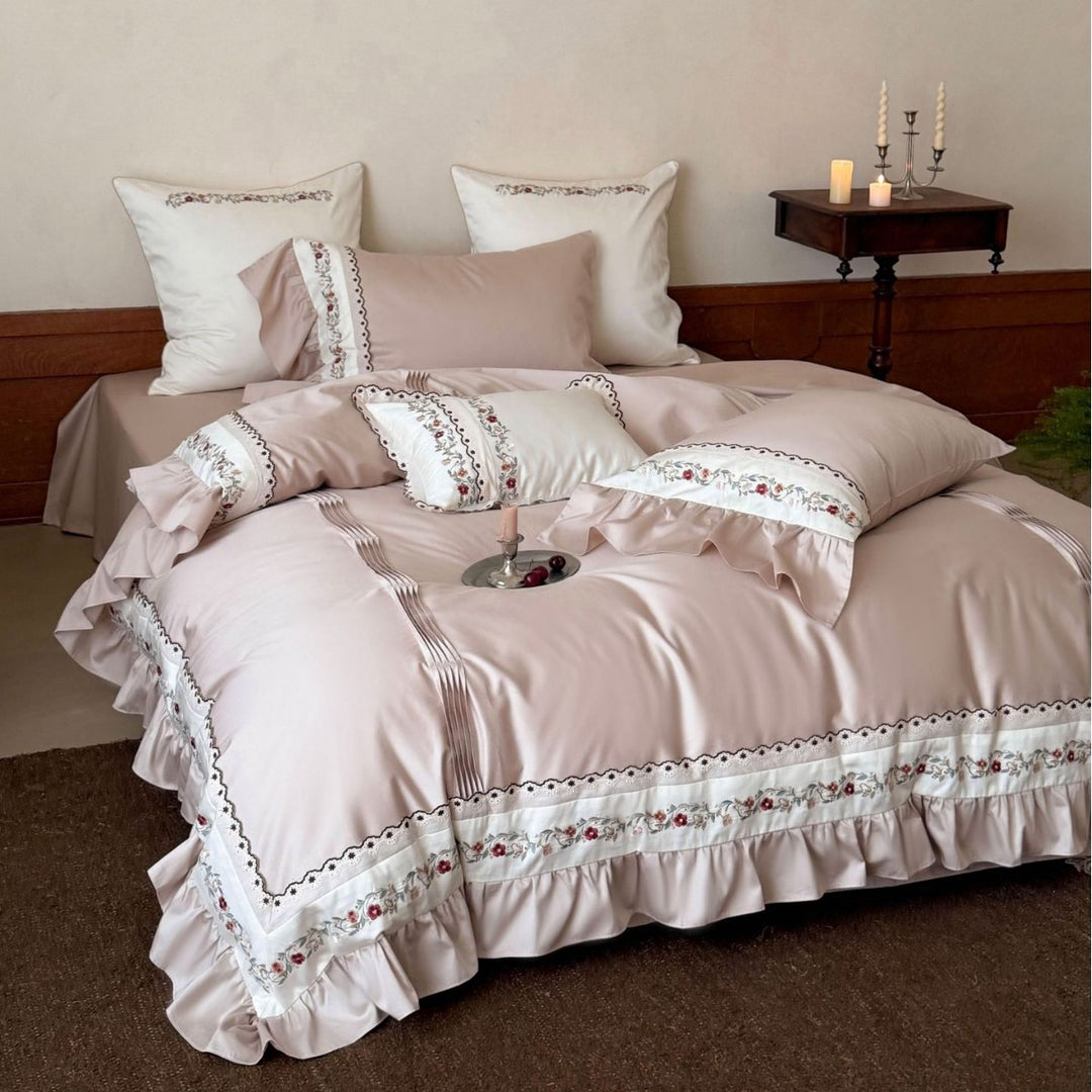 Luxurious embroidered bedding set with ruffles and satin