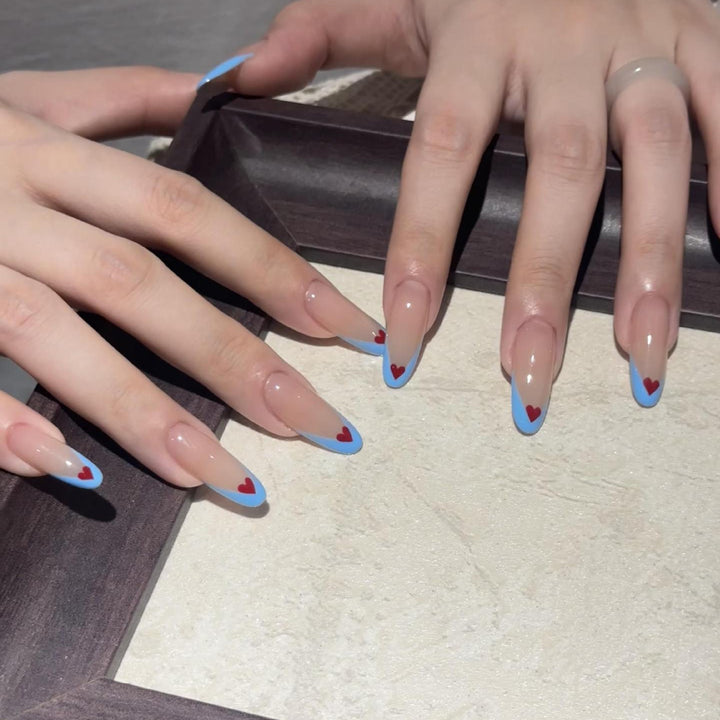 Nail art with heart-shaped design Stornfield