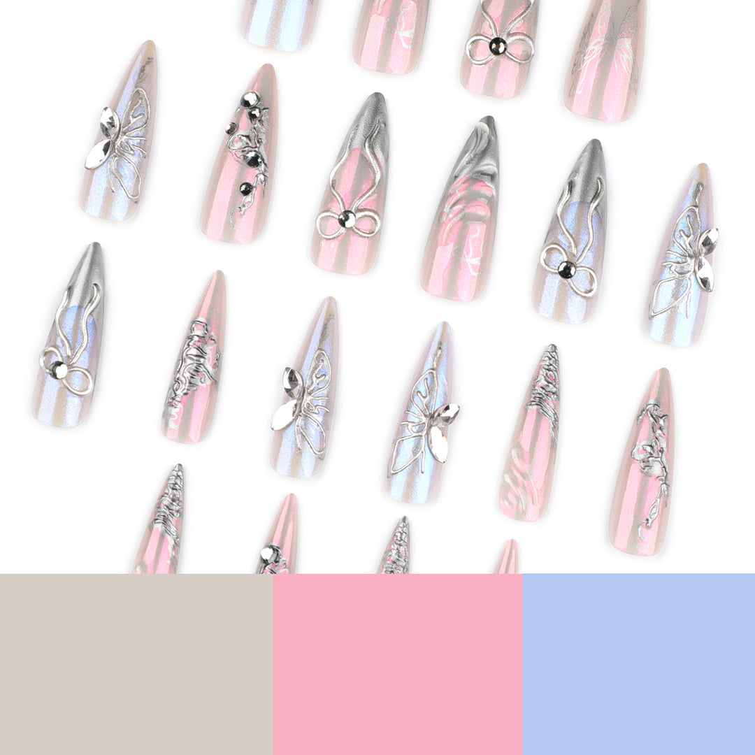 Artful stiletto nails with delicate silver casting decoration Stornfield