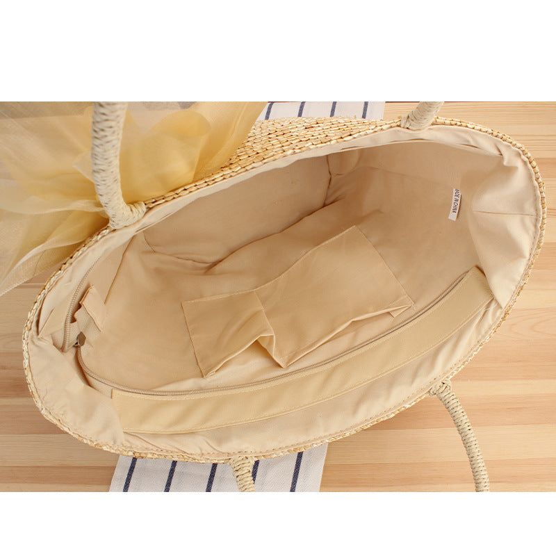 Elegant straw bag with floral accents Stornfield