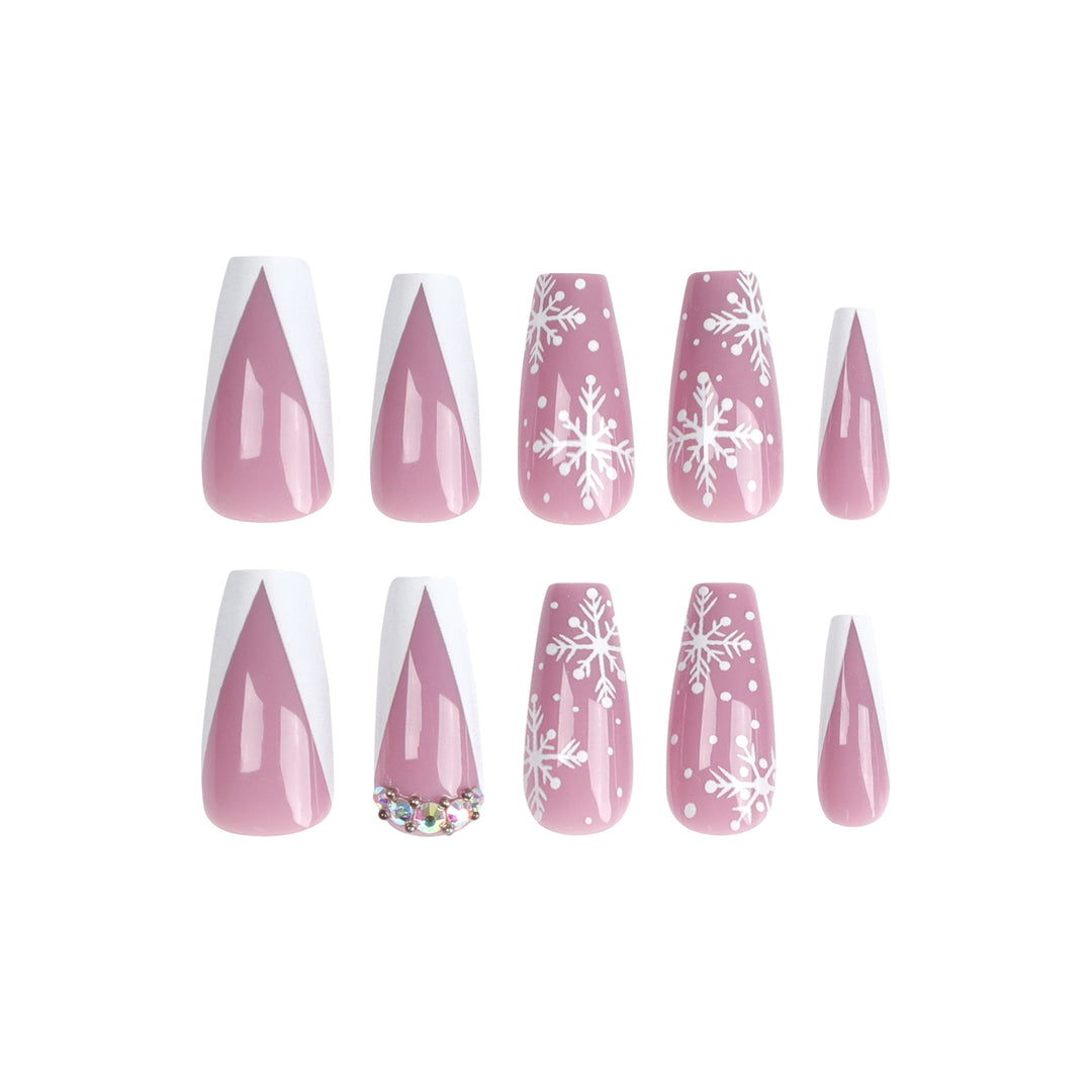 Artistic Nail Extensions with Snowflake Design and Glitter Accents Stornfield