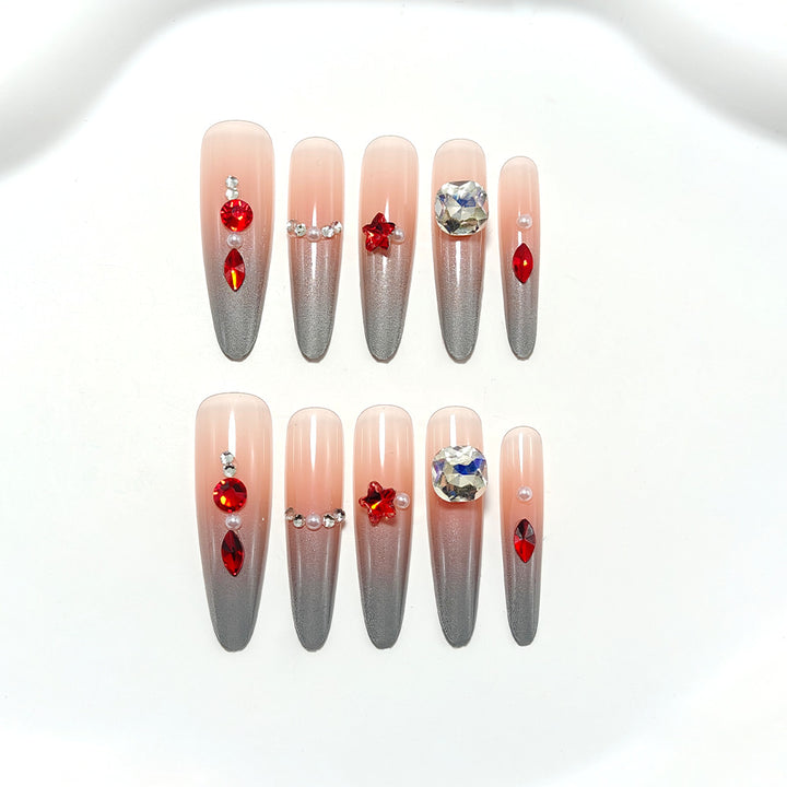 Sparkling artificial nails with decorative rhinestones Stornfield