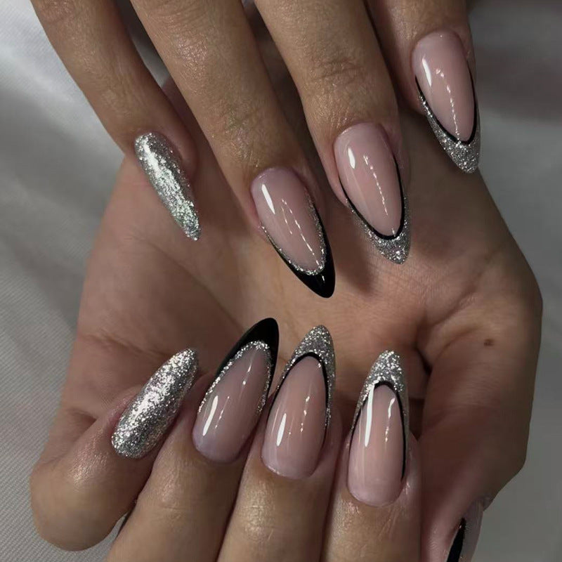 Artificial nail set with glamorous glitter accents and elegant black Stornfield