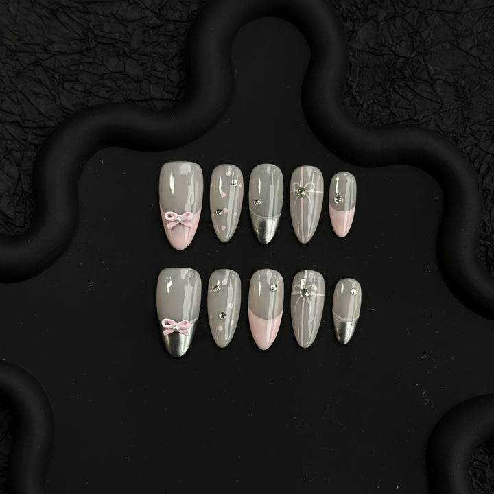 Elegant Press-On Nail Art Set with Decorative Bow and Gem Accents