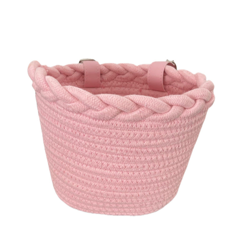 braided rope bike basket with pom pom embellishments and leather handlebar straps Stornfield