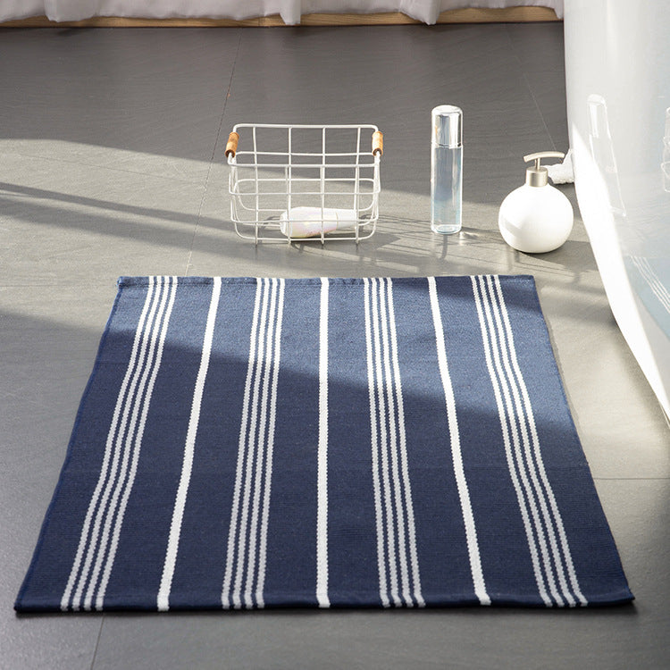 Flat striped carpet runner made of cotton blend with anti-slip coating and easy-care woven structure