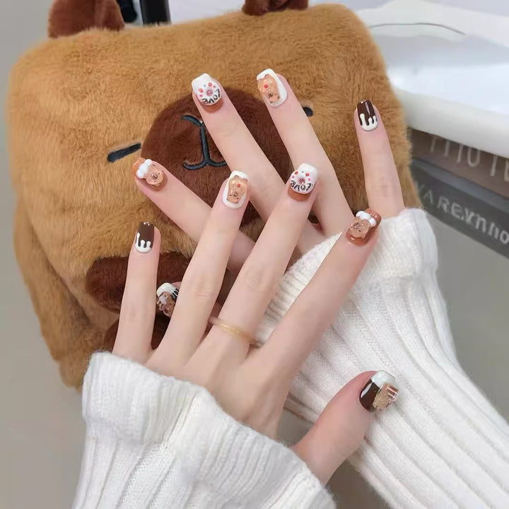 Playful art fake nails with animal motifs Stornfield