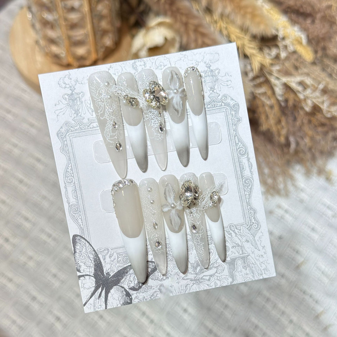 Decorative Stiletto Press-On Nail Art Set with Elegant Lace and Gemstone Accents Stornfield