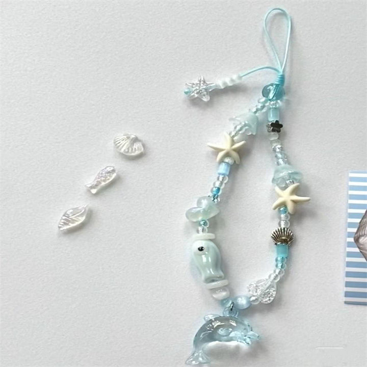 Dolphin-Themed Beaded Charm Eyewear Holder Stornfield