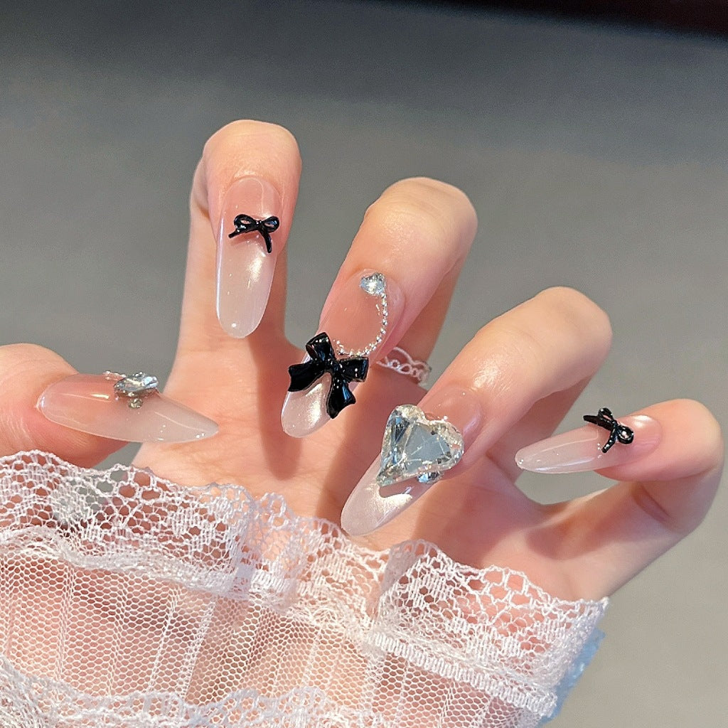 Elegant Nail Art Extensions with Pearl Accents Stornfield