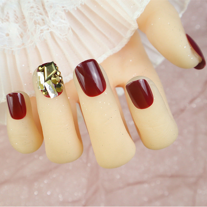 Glossy Press-On Nail Set with Decorative Gem Accents Stornfield