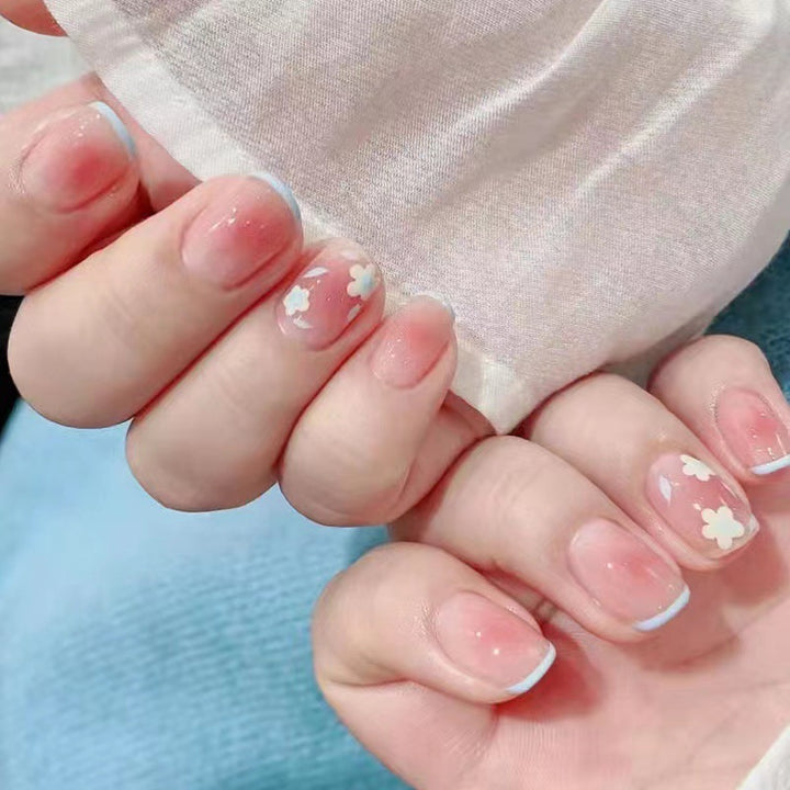 Artistic gel nails with delicate floral designs Stornfield
