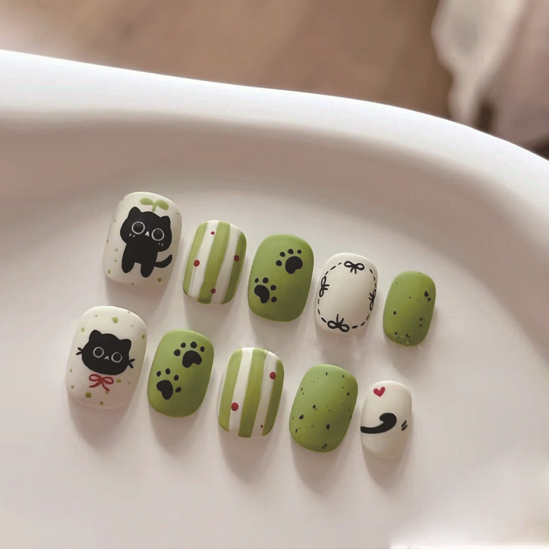 Creative art press-on nails with playful animal design Stornfield
