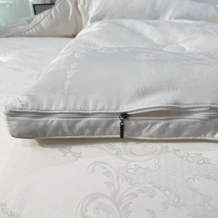 Quilted down look comforter with fine jacquard satin cover and crown embroidery