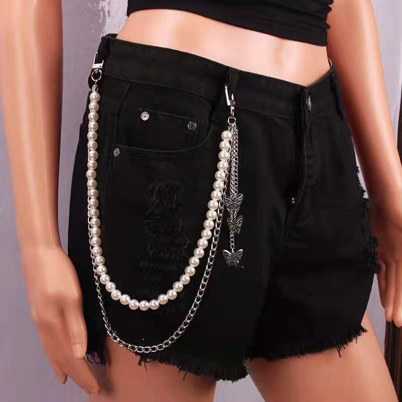 Fashionable belt with pearl and chain pendants Stornfield