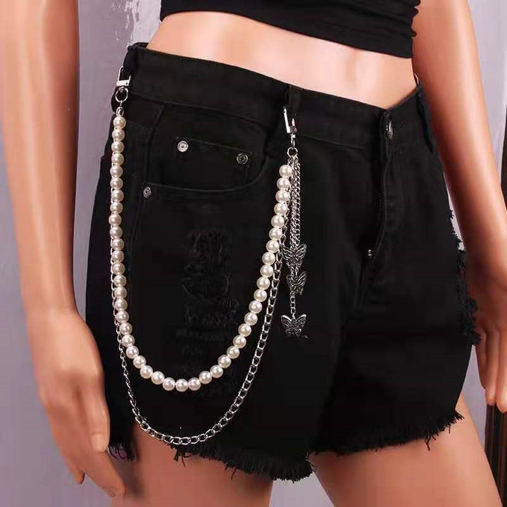Fashionable belt with pearl and chain pendants Stornfield