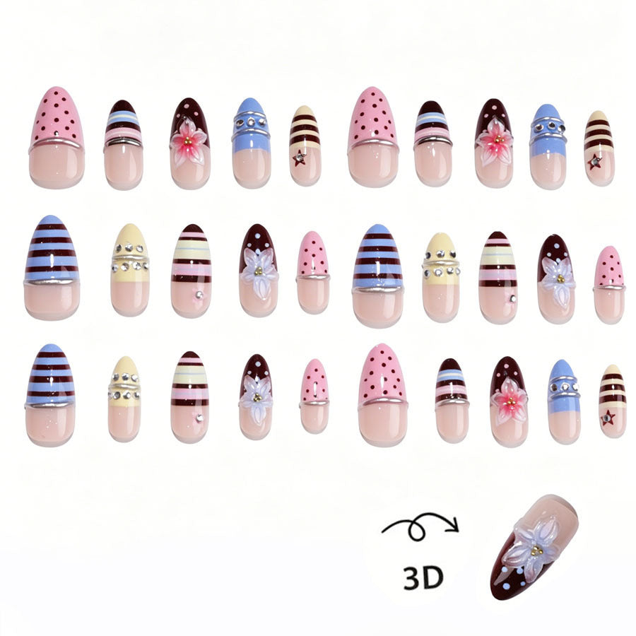 Creative nail art set with floral and striped accents Stornfield