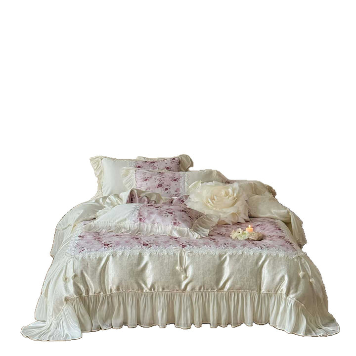 Romantic bedding and bedspread set with ruffles, lace trim, and floral quilting