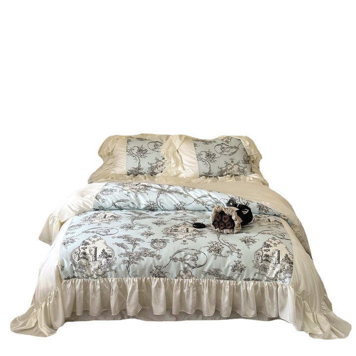 Romantic satin bedding set with ruffles, frills, and classic toile motif