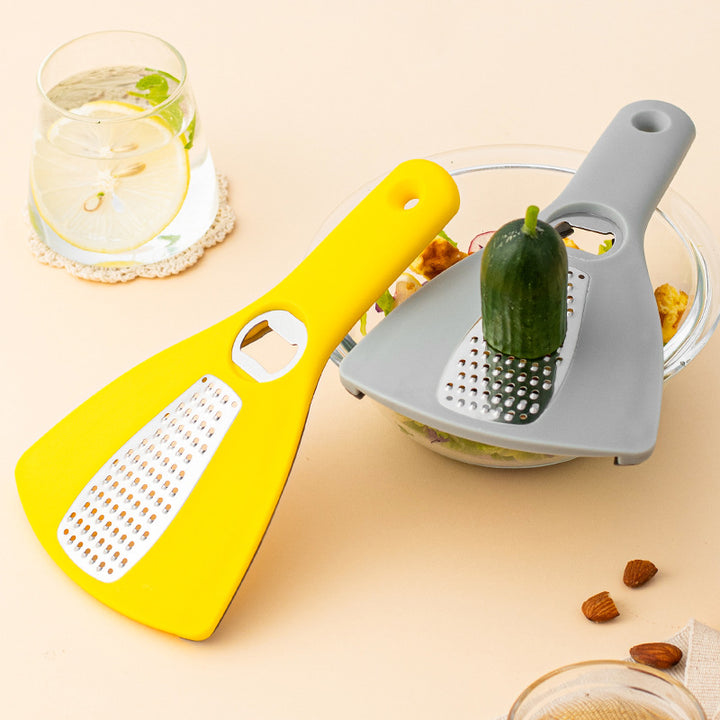 Multifunctional kitchen grater with integrated bottle opener function Stornfield