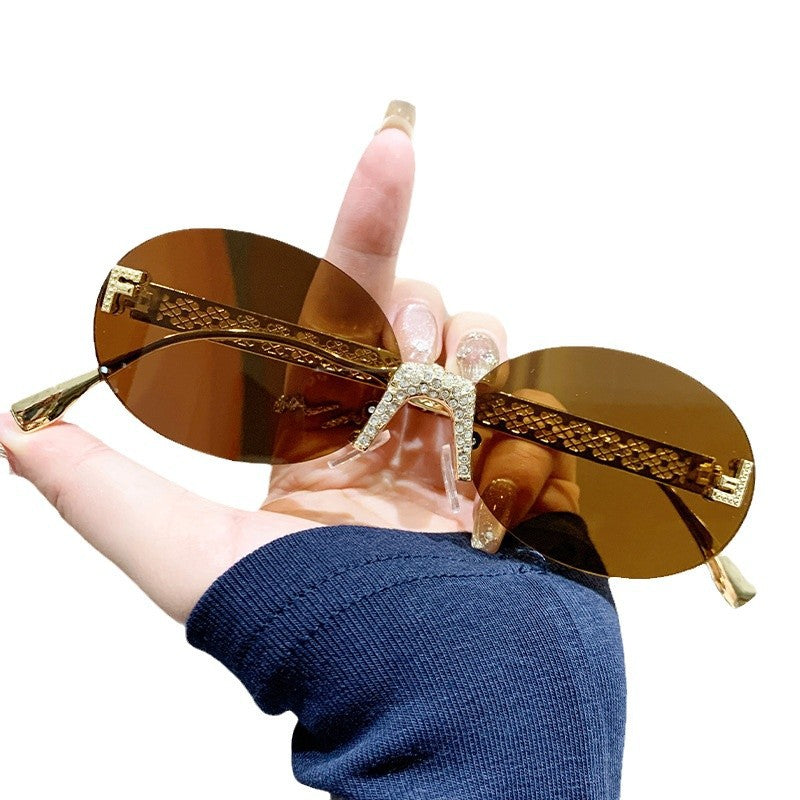 Women's sunglasses with glittering frame and oval lenses Stornfield