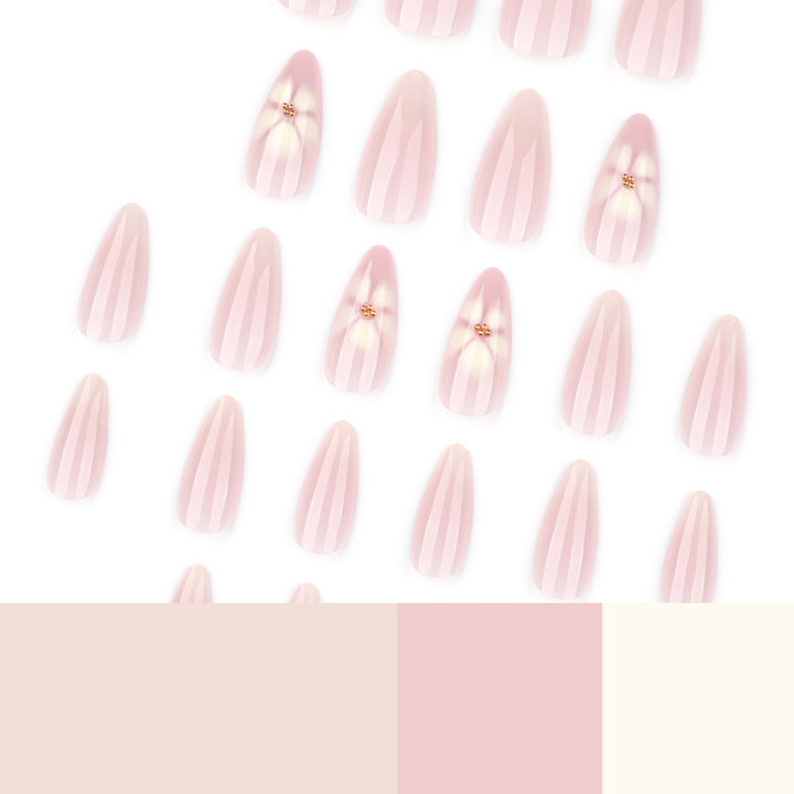Elegant Stiletto Nails with Floral Accents Stornfield