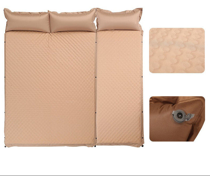 double connectable inflatable camping mattress with integrated dual pillows, egg-crate comfort surface and compact carry sack Stornfield
