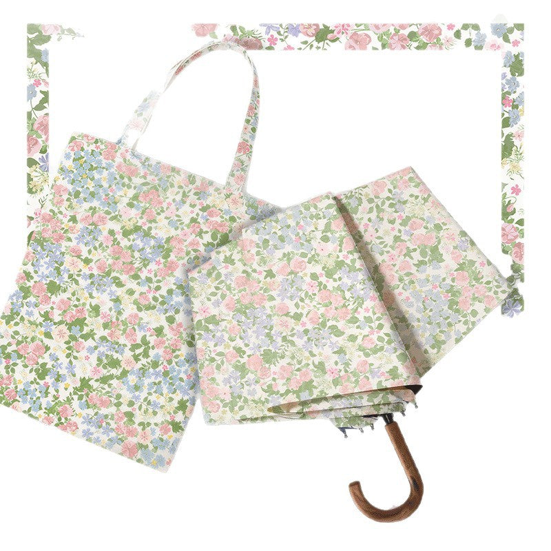 Women Folding Umbrella with Exquisite Floral Design Stornfield