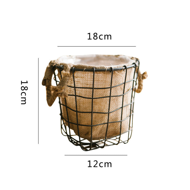 Decorative storage basket made of wire and linen Stornfield