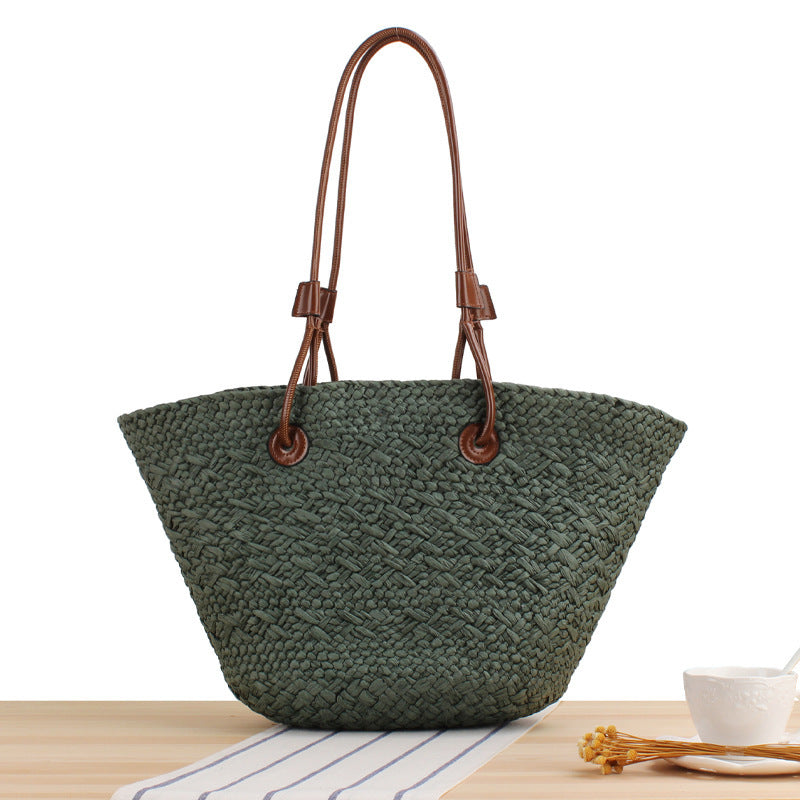 Beach bag made of high-quality braided straw with stylish leather handles Stornfield