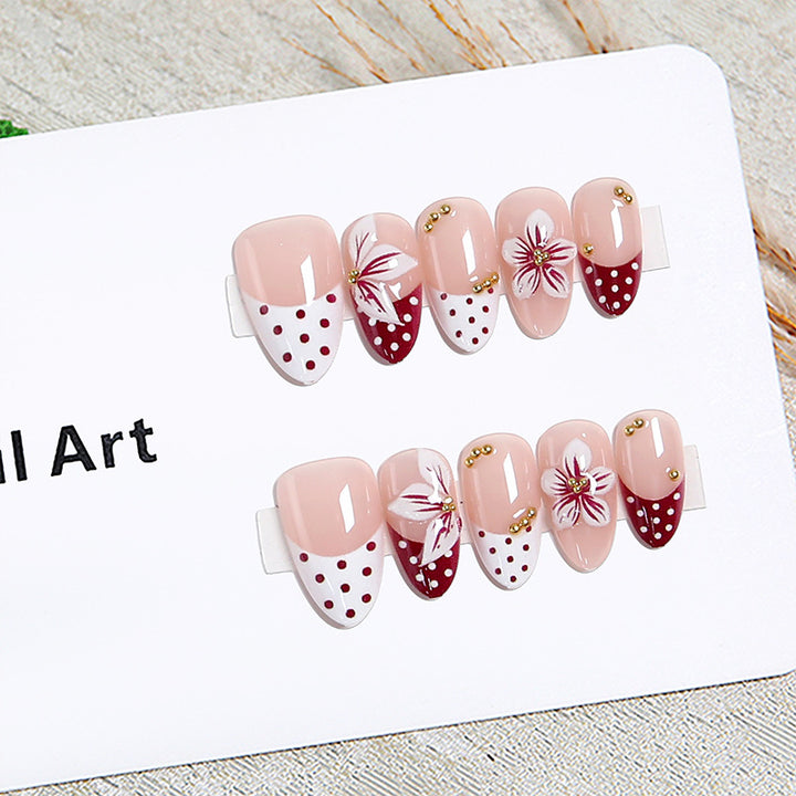 Artistic Nail Tips with Floral Decoration Stornfield