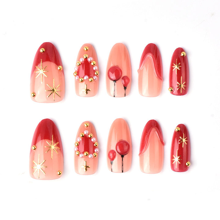 Elegant artificial nails with romantic gold and pearl embellishments Stornfield