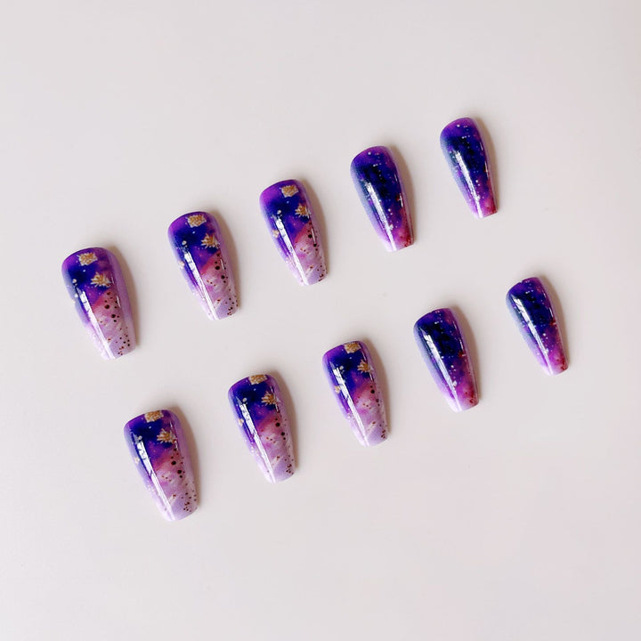 Glittering artificial nail tips in galaxy design Stornfield