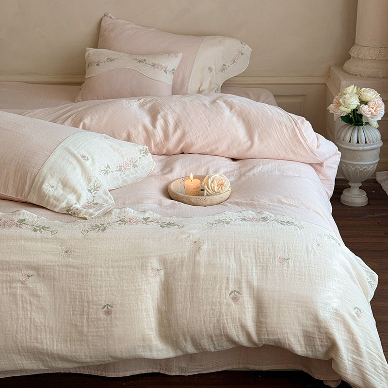 Bedding set made of washed linen with floral embroidery border